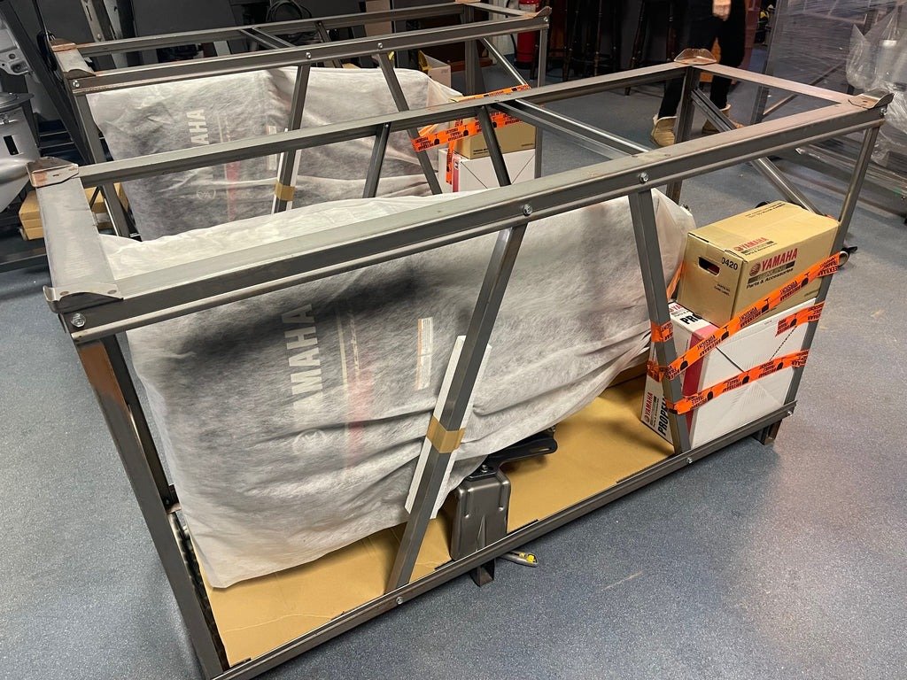 Yamaha outboard motor securely packed in a wooden shipping crate ready for Australia-wide delivery